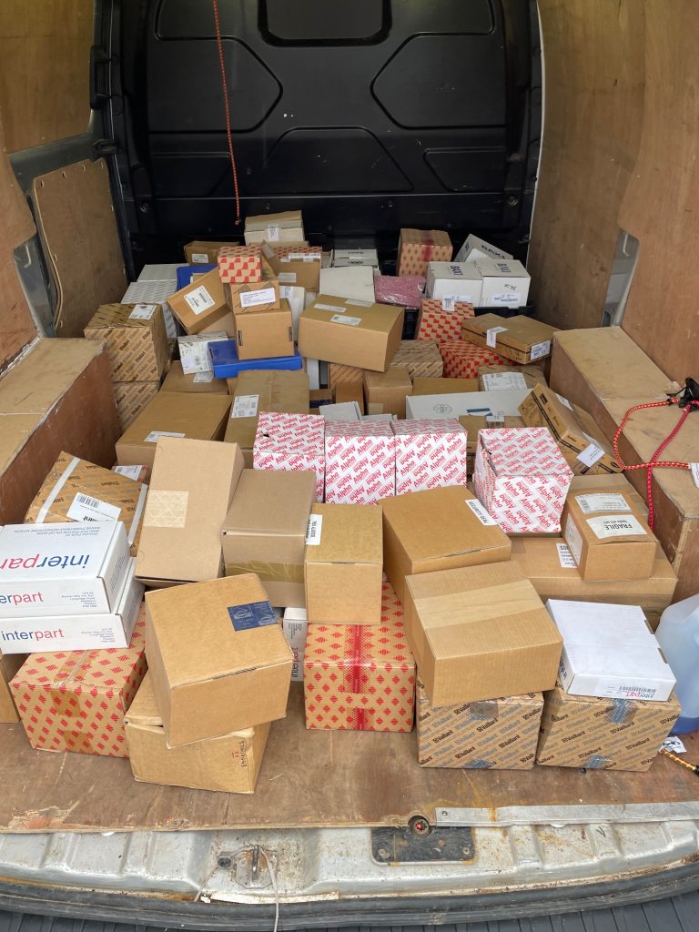 Van load of boxes of boiler parts